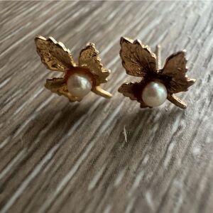 Vintage 14k gold maple leaf earrings with seed pearl in the center